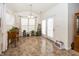 Cozy dining area with large windows, tile flooring, and ample natural light at 14014 Fieldcrest Dr, McCordsville, IN 46055