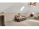Bonus room featuring a cozy seating area, skylight, and plenty of space for relaxing or entertaining at 1611 Connemara Rd, Indianapolis, IN 46217