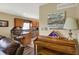 The kitchen has stainless steel appliances, granite countertops, tile backsplash and a breakfast bar at 1611 Connemara Rd, Indianapolis, IN 46217