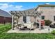 Charming pergola-covered patio perfect for outdoor relaxation and entertaining at 1611 Connemara Rd, Indianapolis, IN 46217
