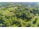 Stunning aerial view of a lush, green property with mature trees and open meadows at 16632 Oak Rd, Westfield, IN 46074