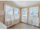 Bright breakfast nook featuring large windows and neutral decor, perfect for enjoying morning sunlight at 16632 Oak Rd, Westfield, IN 46074