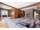 Bright living room with wood beam ceilings and a stone fireplace at 16632 Oak Rd, Westfield, IN 46074
