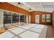 Bright sunroom featuring wood paneling and a glass ceiling at 16632 Oak Rd, Westfield, IN 46074