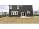 Exterior of this two story home with a sliding glass door that provides plenty of natural light at 17039 Silo Ridge Way, Noblesville, IN 46060
