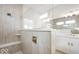 Modern bathroom boasting a glass shower with tiled walls, a rain shower head, and contemporary fixtures at 19590 Wood Farm Pl, Westfield, IN 46074