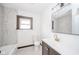 Modern bathroom features tile and new fixtures at 2034 Mansfield St, Indianapolis, IN 46202