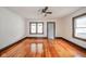 Bright and airy living room featuring beautiful hardwood floors and new windows at 2034 Mansfield St, Indianapolis, IN 46202