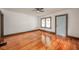 Hardwood floors and natural light create an inviting living space at 2034 Mansfield St, Indianapolis, IN 46202