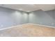 Large finished basement offering ample space with carpeted and linoleum flooring at 2215 Golfside Dr, Lebanon, IN 46052