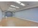 Spacious basement with recessed lighting and built-in shelving at 2215 Golfside Dr, Lebanon, IN 46052