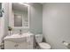 Powder room with a pedestal sink and a white toilet at 2215 Golfside Dr, Lebanon, IN 46052