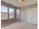 Neutral carpeted bedroom with a large window allowing lots of natural light and a closet for ample storage at 2215 Golfside Dr, Lebanon, IN 46052