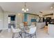 Open-concept kitchen features tile floors, access to living area and modern appliances at 2215 Golfside Dr, Lebanon, IN 46052