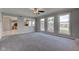 Spacious living area with large windows offering an abundance of natural light at 2215 Golfside Dr, Lebanon, IN 46052