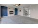 Spacious living room with a brick fireplace and neutral carpet at 2215 Golfside Dr, Lebanon, IN 46052