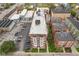 Aerial view of building, parking lot, and surrounding buildings in the neighborhood at 230 E 9Th St # 401, Indianapolis, IN 46204