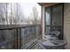 Relaxing balcony with comfortable chairs and city views at 233 E Saint Joseph St # 2G, Indianapolis, IN 46202
