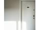 Neutral-colored door with a unit number, complemented by a matching wall at 233 E Saint Joseph St # 2G, Indianapolis, IN 46202