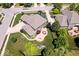 A bird's-eye view showcases the property's well-maintained landscaping, brick exterior, and outdoor patio at 2705 April Springs View, Carmel, IN 46074
