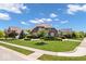 Beautiful brick home with a well-maintained lawn and mature trees enhancing its curb appeal at 2705 April Springs View, Carmel, IN 46074