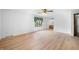 Spacious bedroom with wood-look floors, a ceiling fan, and natural light from a window at 273 N Serenity Way, Greenwood, IN 46142