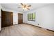 Bedroom with hardwood floors, ceiling fan, window with curtains, and neutral walls at 273 N Serenity Way, Greenwood, IN 46142