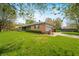 Spacious home with attached garage and a well-manicured lawn at 273 N Serenity Way, Greenwood, IN 46142