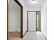 Bright foyer featuring tile flooring and an entry door with window at 273 N Serenity Way, Greenwood, IN 46142