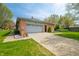 Spacious attached garage with a large driveway and well-kept surroundings at 273 N Serenity Way, Greenwood, IN 46142