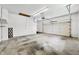 Bright two-car garage with overhead lighting and automatic garage door at 273 N Serenity Way, Greenwood, IN 46142