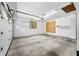 Spacious two-car garage with window, storage shelves, and automatic door opener at 273 N Serenity Way, Greenwood, IN 46142