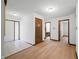 Hallway featuring wood floors and access to other rooms at 273 N Serenity Way, Greenwood, IN 46142