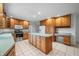 Spacious kitchen with oak cabinets, a center island and an eat-in area at 273 N Serenity Way, Greenwood, IN 46142