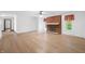 Bright living room featuring brick fireplace, hardwood floors, and natural light at 273 N Serenity Way, Greenwood, IN 46142