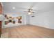 Bright living room with hardwood floors and view into open kitchen at 273 N Serenity Way, Greenwood, IN 46142
