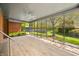 Cozy sunroom featuring ceiling fan, and views of the landscaped backyard at 273 N Serenity Way, Greenwood, IN 46142