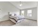 Bright bedroom with vaulted ceiling, neutral paint, ceiling fan, and lots of natural light at 286 Fairfax Ln, Greenwood, IN 46142