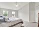 Spacious bedroom featuring neutral paint, ceiling fan, and two large windows at 286 Fairfax Ln, Greenwood, IN 46142