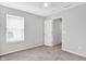 This bedroom has neutral walls, one window, and carpeted floors at 286 Fairfax Ln, Greenwood, IN 46142