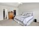 This spacious bedroom features vaulted ceilings, neutral paint, and a ceiling fan at 286 Fairfax Ln, Greenwood, IN 46142