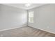 This bedroom has neutral walls, one window, carpeted floors, and a ceiling fan at 286 Fairfax Ln, Greenwood, IN 46142