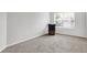 This carpeted bedroom has neutral walls, one window, and space for decor at 286 Fairfax Ln, Greenwood, IN 46142