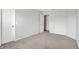 Bright bedroom featuring neutral walls, plush carpet, and a closet for ample storage at 286 Fairfax Ln, Greenwood, IN 46142