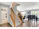 Welcoming entryway with a staircase and open view of the living and dining area at 286 Fairfax Ln, Greenwood, IN 46142