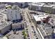 Wide aerial view of the building's surrounding neighborhood and the parking area at 333 Massachusetts Ave # 303, Indianapolis, IN 46204