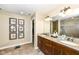 Double vanity with granite countertop in the Primary bathroom for added convenience at 333 Massachusetts Ave # 303, Indianapolis, IN 46204