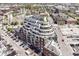 Aerial view showcasing the surrounding neighborhood and modern architecture of the building at 333 Massachusetts Ave # 303, Indianapolis, IN 46204