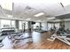 Spacious gym area with treadmills, weight machines, and ample natural light from large windows at 333 Massachusetts Ave # 303, Indianapolis, IN 46204