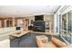 Inviting living room featuring a fireplace, large windows, and comfortable seating area at 333 Massachusetts Ave # 303, Indianapolis, IN 46204